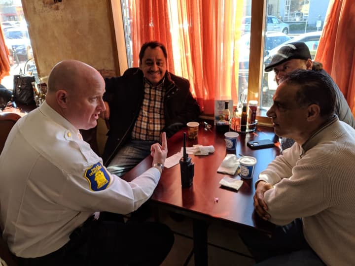 The Yonkers Police Department has emphasized improving cohesion within the community. Here, officers met with local residents for &quot;Coffee with a Cop.&quot;