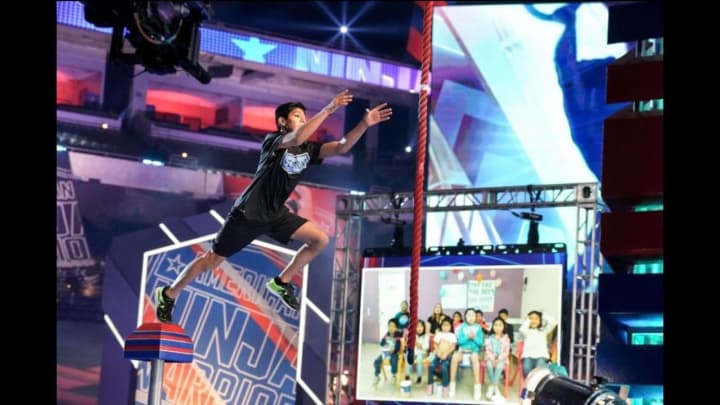 Jacob Arnstein competing during the qualification round of Season 14 of American Ninja Warrior