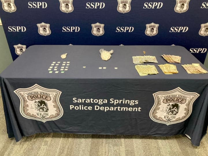 Saratoga Springs Police arrested two horse groomers on drug charges following an investigation at Saratoga Race Course Thursday, Aug. 18.