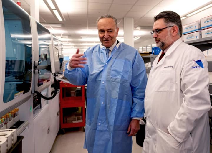 Sen. Chuck Schumer and Northwell Health’s Dr. Dwayne Breining tour Northwell Health’s Core Lab in Lake Success, NY on March 2. Northwell will begin testing for COVID-19 this week. Credit Northwell Health.