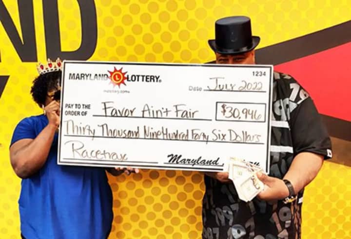 Racetrax “longshots” brought this Hyattsville woman and her husband back to the Winner’s Circle to claim a second $30,946 prize.
