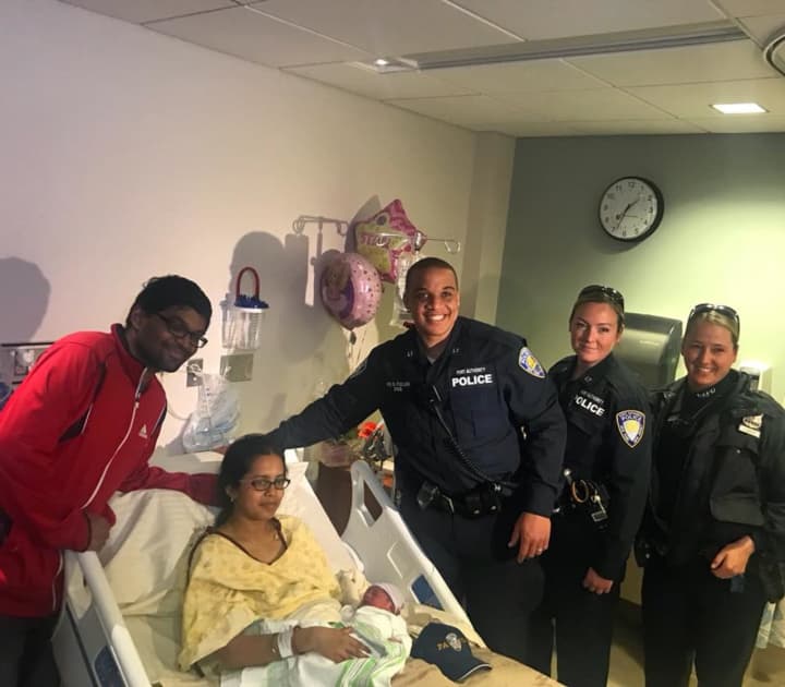Sathya Priya Senthil of Jersey City delivered a healthy baby girl outside the Lincoln Tunnel Monday morning with the help from Port Authority police officers.