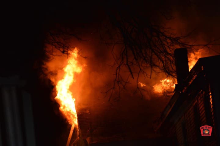 Flames shooting from an apartment building at 52 Hampshire Street in Methuen