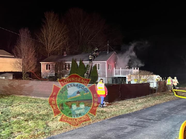 Crews responding to a two-alarm fire at 47 Mill Street in Pepperell, MA