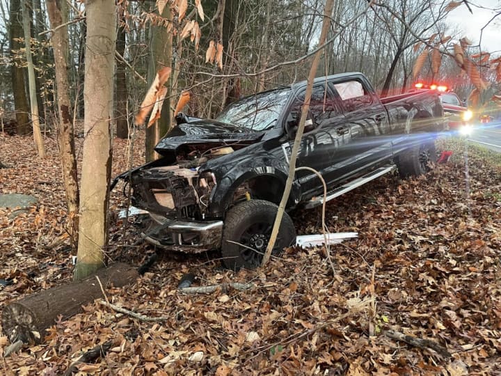 A truck hit a tree in Somers on Route 202, fire officials said.