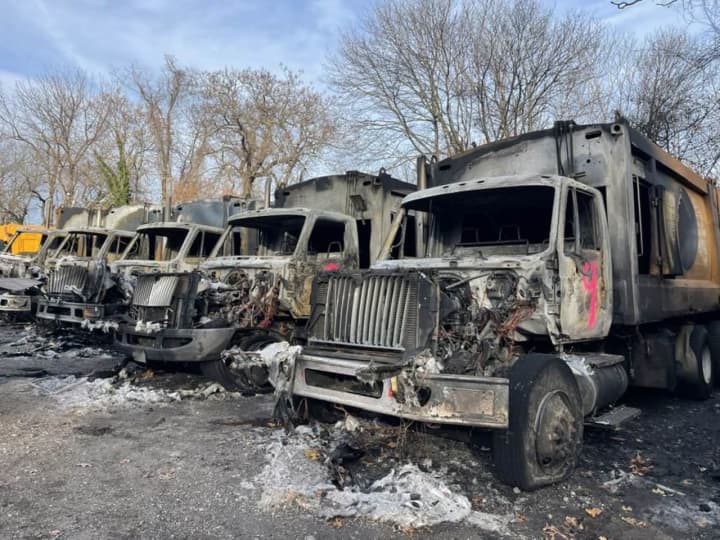 Six garbage trucks were destroyed in a fire in Huntington.