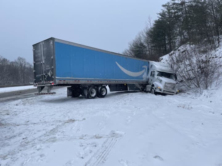 An Amazon tractor-trailer crashed on I-84 in Willington, spilling fuel.