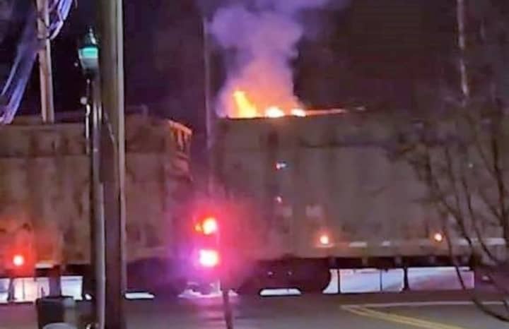 The train car caught fire on the tracks in Maywood overnight Friday, March 17.