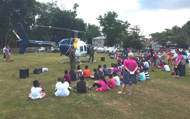 They could beat the heat, but the Englewood youngsters couldn&#x27;t beat a medical chopper landing outside the Dr. John Greico School.