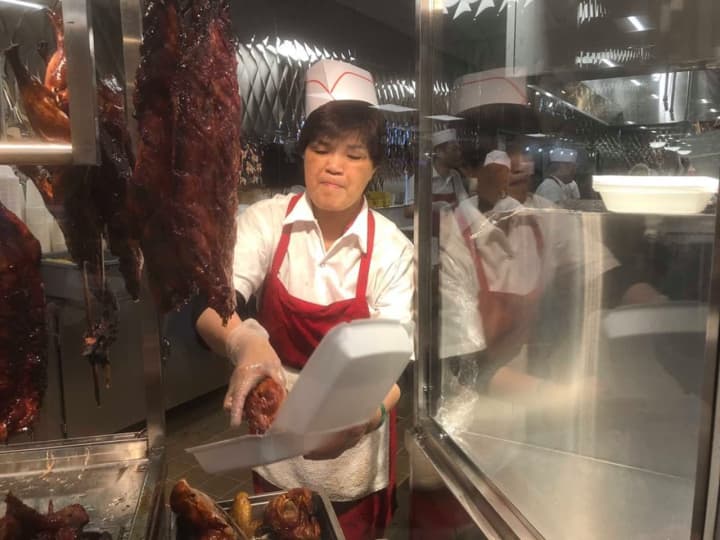 Pile roasted meats into your to-go box at 99 Ranch Market in Hackensack.