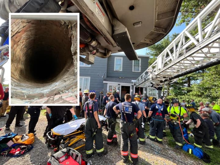 Firefighters rescue a woman from a 20-foot well in Pilesgrove.