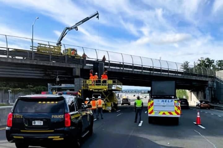 Inspectors at work on the South Broadway bridge in Nyack over the New York State Thruway approach to the Tappan Zee Bridge.
