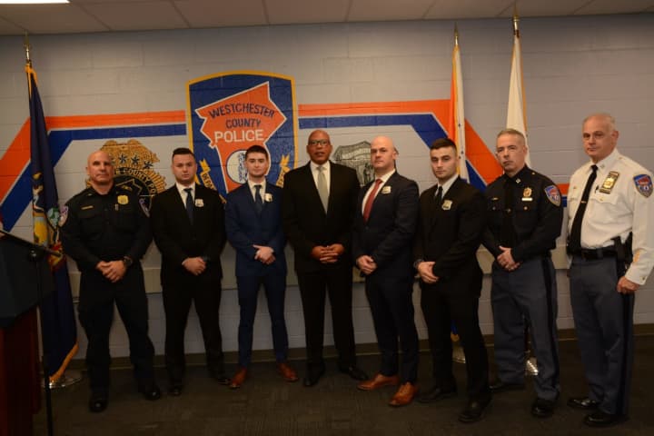 Former Westchester County Police Officer Joseph Saetta (second from left) has filed a lawsuit against the county's Department of Public Safety, as well as its commissioner, Terrance Raynor (fourth from left).&nbsp;