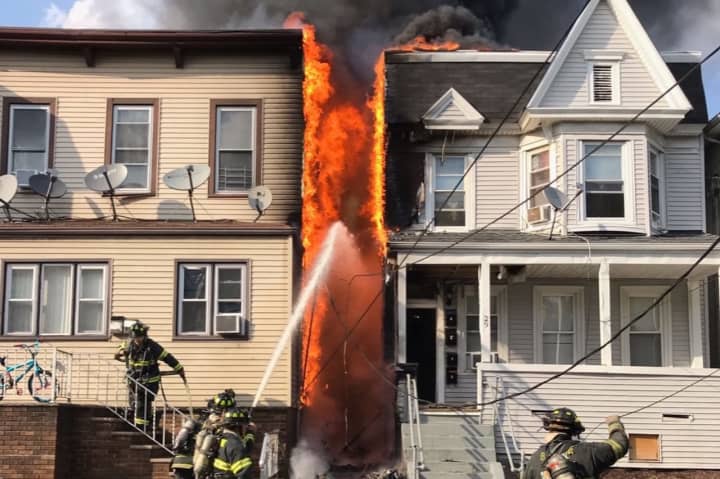 A fire in Bayonne was brought under control in about an hour Wednesday but not before heavily damaging two homes.