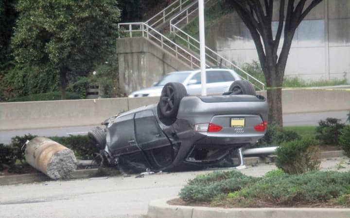 The Audi landed on its roof in Kohls parking lot.