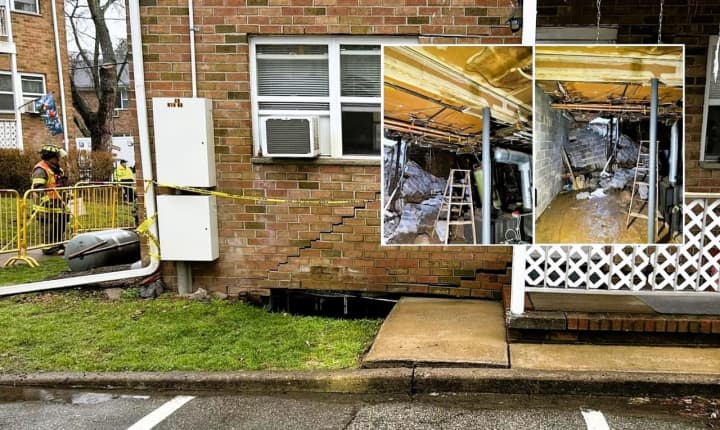 The rear wall and portions of the first floor collapsed into the basement of the Building E at the Hawthorne Garden Apartments on Rock Road around 9 a.m. Sunday, Jan. 28.