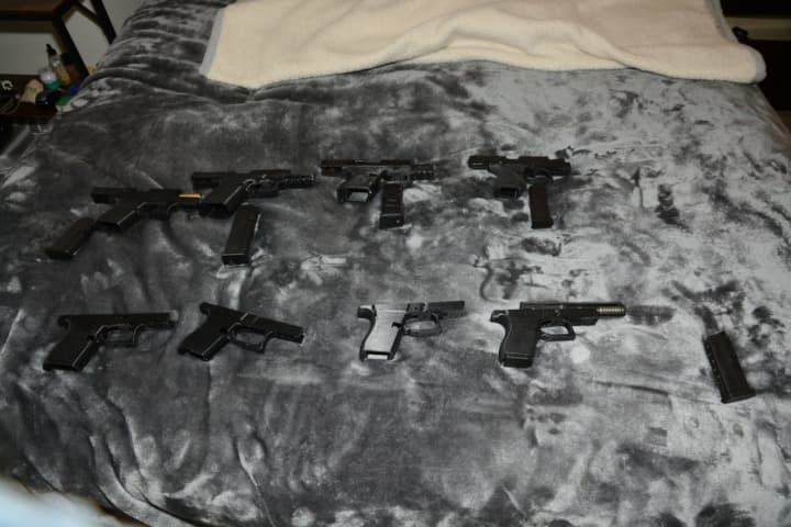 These firearms were seized from Hennes' possession, police said.