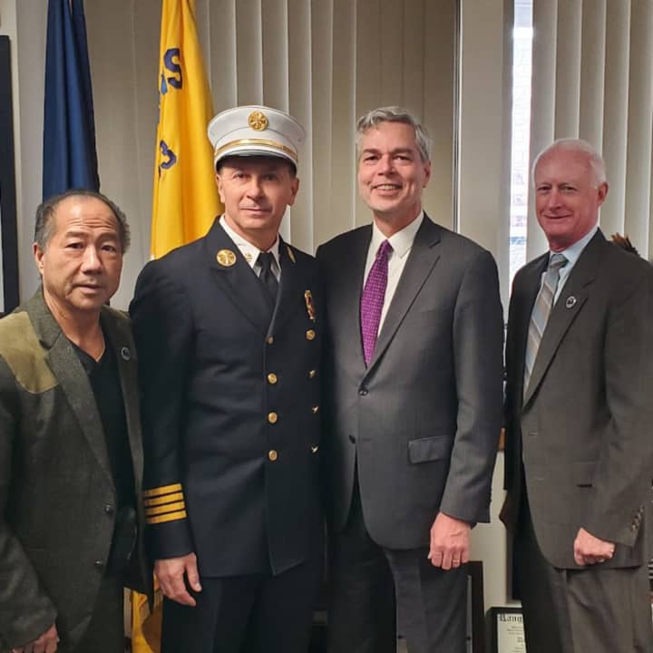 White Plains Temporary Fire Chief Claudio Petriccione (second from left) was sworn in during a ceremony on Thursday, April 4.&nbsp;