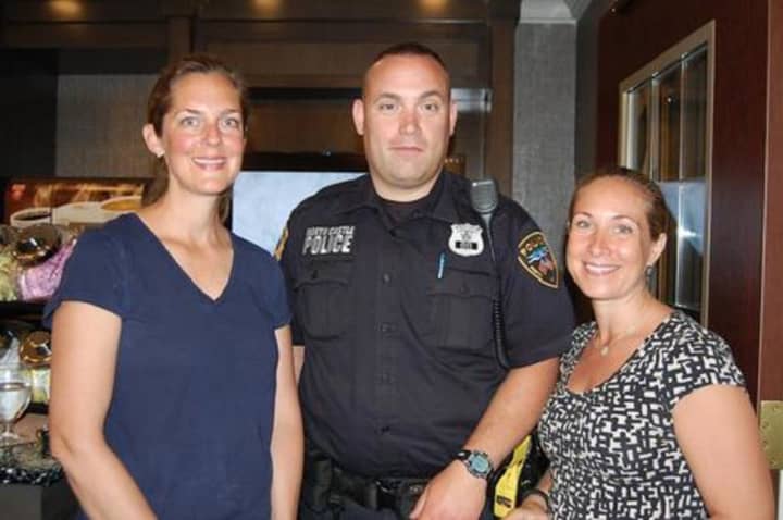 Stayin&#x27; Alive cofounders, right to left, Michelle Berliner and Christy Saltstein with a New Castle Police Officer. Stayin’ Alive donationed over $36,000 in grants and equipment gifts to Westchester County first responders.