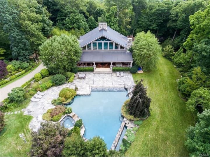 68 Quarry Lane in Bedford has over three acres of beautiful property.