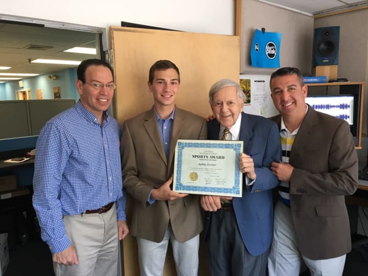 Hendrick Hudson High School senior and Con Ed Athlete of the Week Adam Kissner with his father, Paul Kissner, legendary broadcaster Bob Wolff, and tennis coach Bradley Fredman.