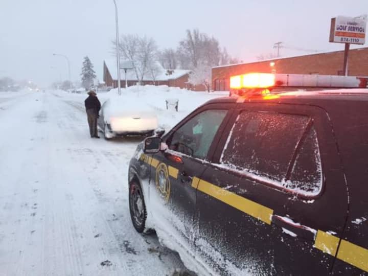 New York State Police troopers arrested a man for alleged impaired driving after he crashed into a snowbank.