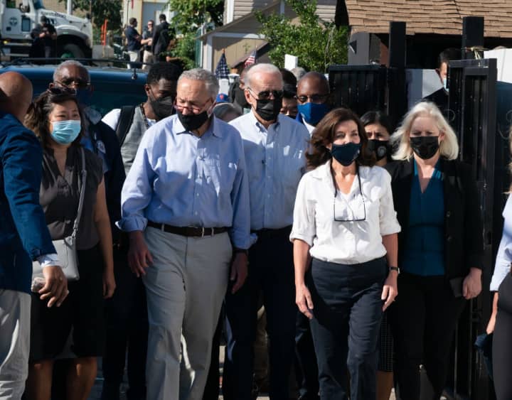 Gov. Kathy Hochul and President Joe Biden visit a storm-damaged neighborhood