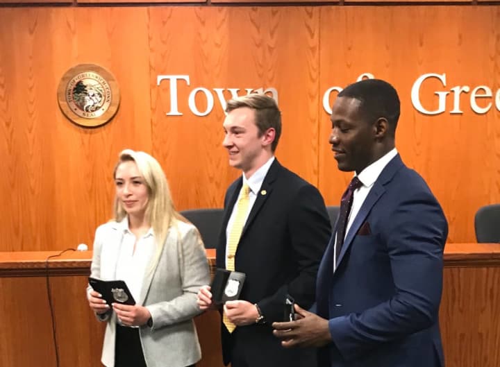 Three new officers, Sabrina Diaz, Thomas Koppelman, and Vladimir Souffrant, are sworn into the Greenwich Police Department.