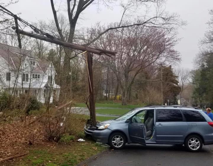 A van slammed into a power pole, causing an outage in the area.