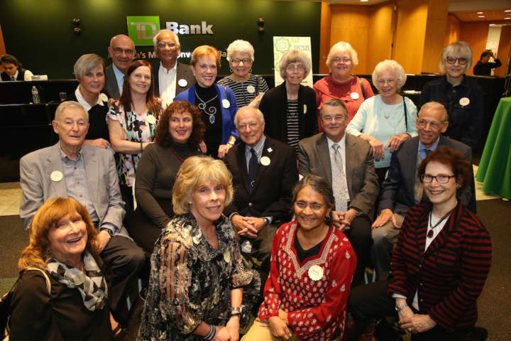 Thirty-five clinical and lay volunteers have donated their time for at least five continuous years to the Bergen Volunteer Medical Initiative. Many of them are shown here at the volunteer appreciation party hosted by TD Bank.