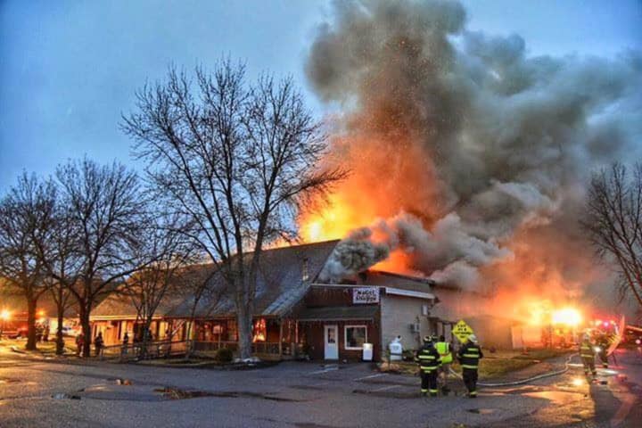 A fire spread quickly Tuesday to destroy businesses and apartments at the Red Hook shopping plaza in Red Hook.