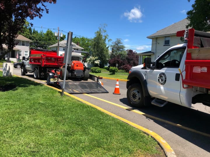 A driver left the scene after striking a DPW worker in Rochelle Park Friday near Midland School, according to police.
