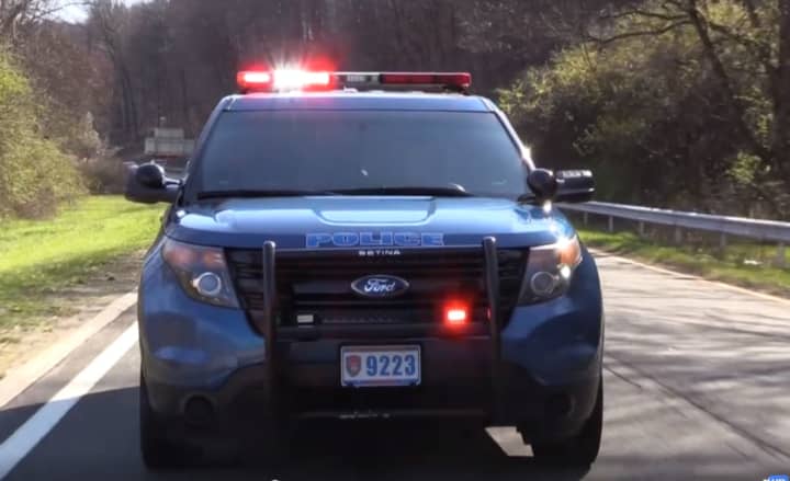 A Westchester County Police officer was injured when his vehicle was rear-ended during a traffic stop in Scarsdale.