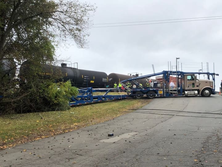 A train was hit by a CSX train while crossing the tracks.