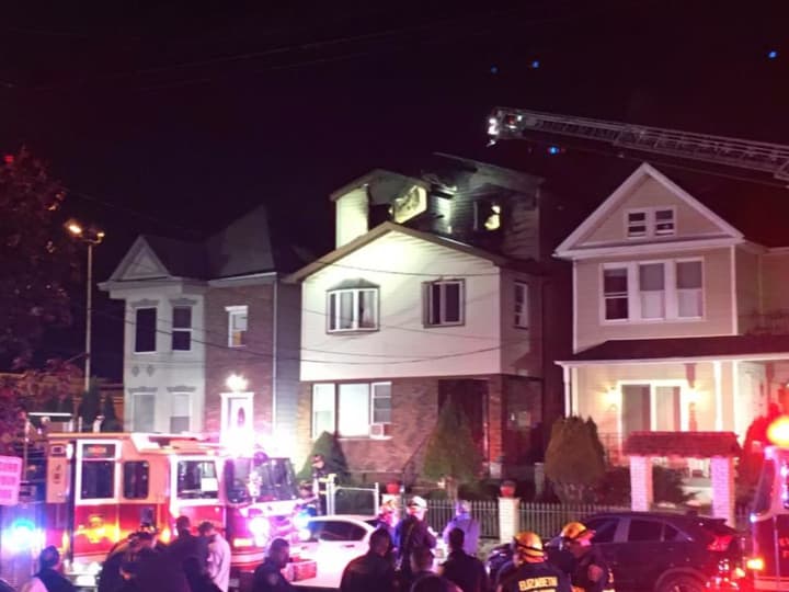 Fire ripped through the top floor of a multifamily Elizabeth home Monday night
