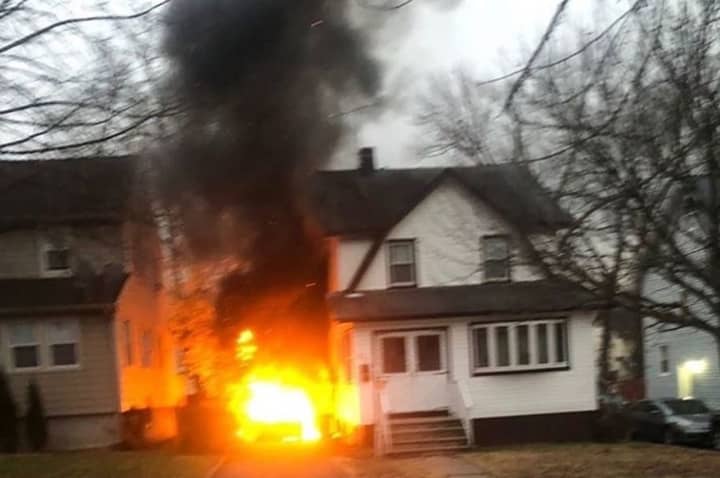 The Tilden Avenue car fire in Teaneck spread to a house. No injuries were reported.