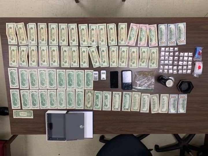 Thirty-nine bags of cocaine, marijuana and $1,775 in cash were seized from a drunk driver, Harding Township police said.
