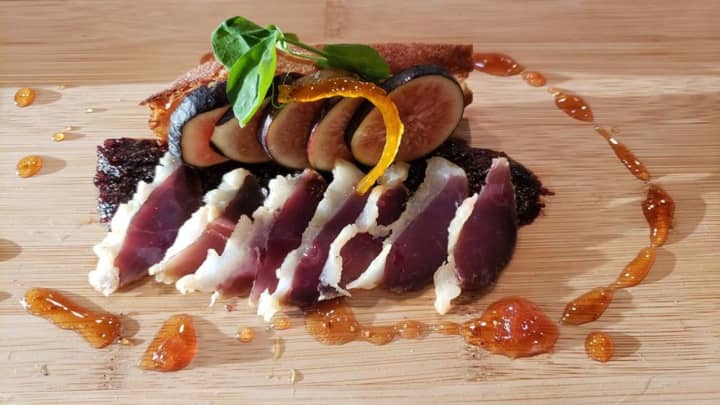 House Cured Duck Prosciutto. Fig Two Ways, Fig-Port Tapenade and Ripe Fig. Candied Orange Zest. Toast. Fig-White Balsamic Gastrique.