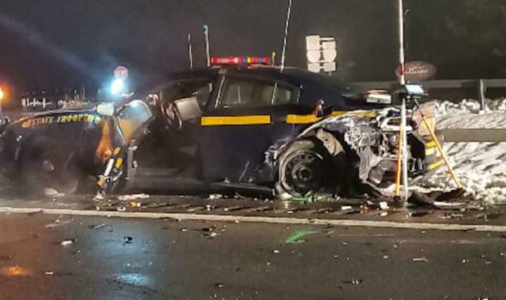 A New York State trooper was injured when his vehicle was hit from behind during a traffic stop.
