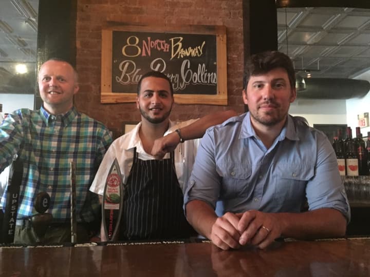 Partner Rich Mitchell, Executive Chef Hichem Habbas, and Chef/Owner Constantine Kalandranis behind the copper bar at 8 North Broadway in Nyack.