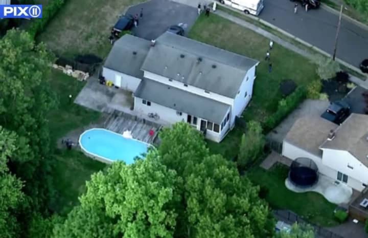 The bodies were found in the backyard pool on Clearview Drive in East Brunswick.