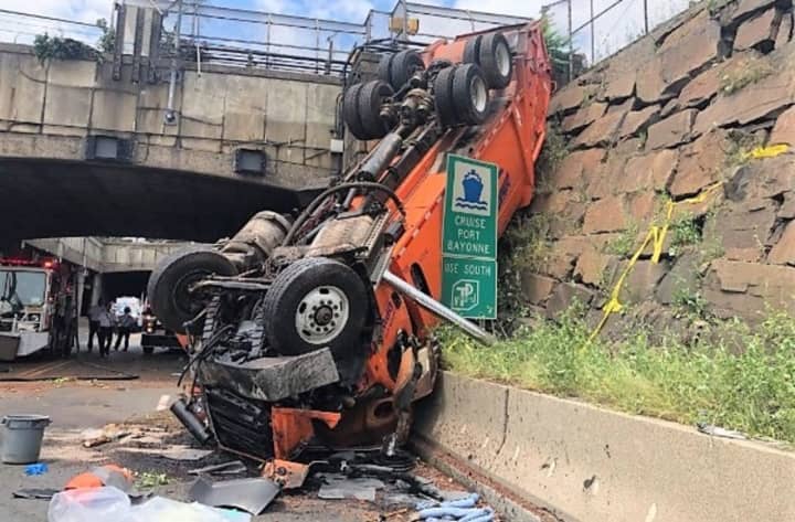 The truck went off the Palisade Avenue overpass and landed nose-first on Route 495 in Weehawken.