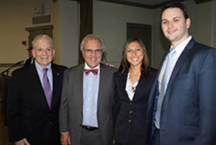 Professor John Politi and Interim Provost Vincent J. Calluzzo, with Kaitlyn Ragolia; Ryan Collins took part in Iona College’s Action Learning Program.