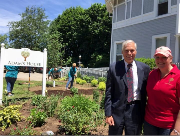 Valley Community Foundation Board Chair Alan Tyma and Adam&#x27;s House Founder Allison Wysota in front of newly planted garden.