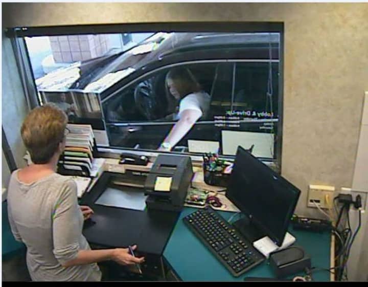 New York State police are asking for help in identifying the woman who tried to cash a stolen check in Mohegan Lake.