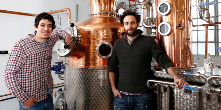 Owners Yoni Rabino and Noah Braunstein of Neversink Spirits in Port Chester are featured in a New York Times article about their distillery.