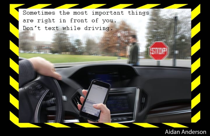 This winning poster by Aidan Anderson will be on display at the Rye YMCA through Feb. 16 as part of a &quot;Heads Up! Distracted Driving and Walking&quot; exhibit that kicked off with a Jan. 25 reception and awards ceremony.