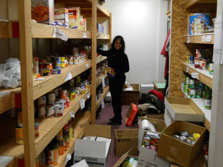 Bergenfield Social Services co-director AnneMarie DellaCruz organizing donations in 2012.