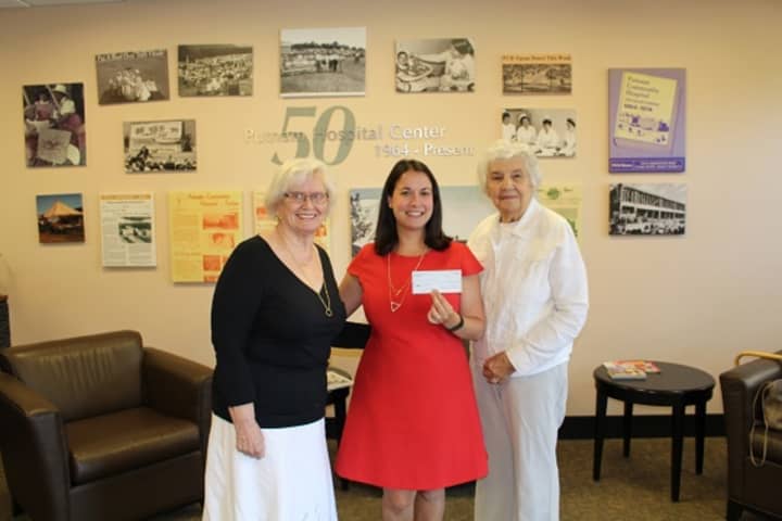 Auxiliary President Margaret Lindblom, Putnam Hospital Center Foundation Executive Director Priscilla Weaver and Auxiliary President Rose McQuade gather for check presentation.