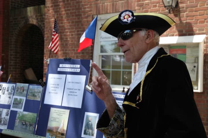 Rich Esnard talks about the Revolutionary War while dressed in Revolutionary garb last year at Bastille Day.